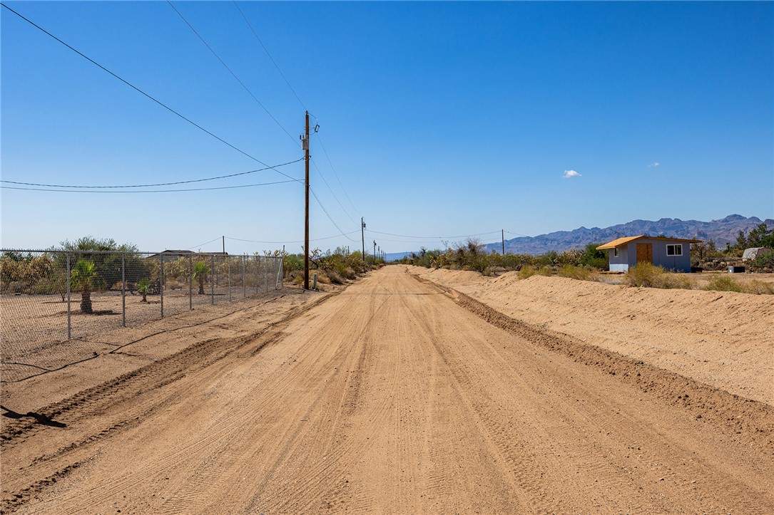 4206 Cordes Road Golden Valley, AZ 86413 - Photo 60 of 60 The property features a dirt road and distant mountain views