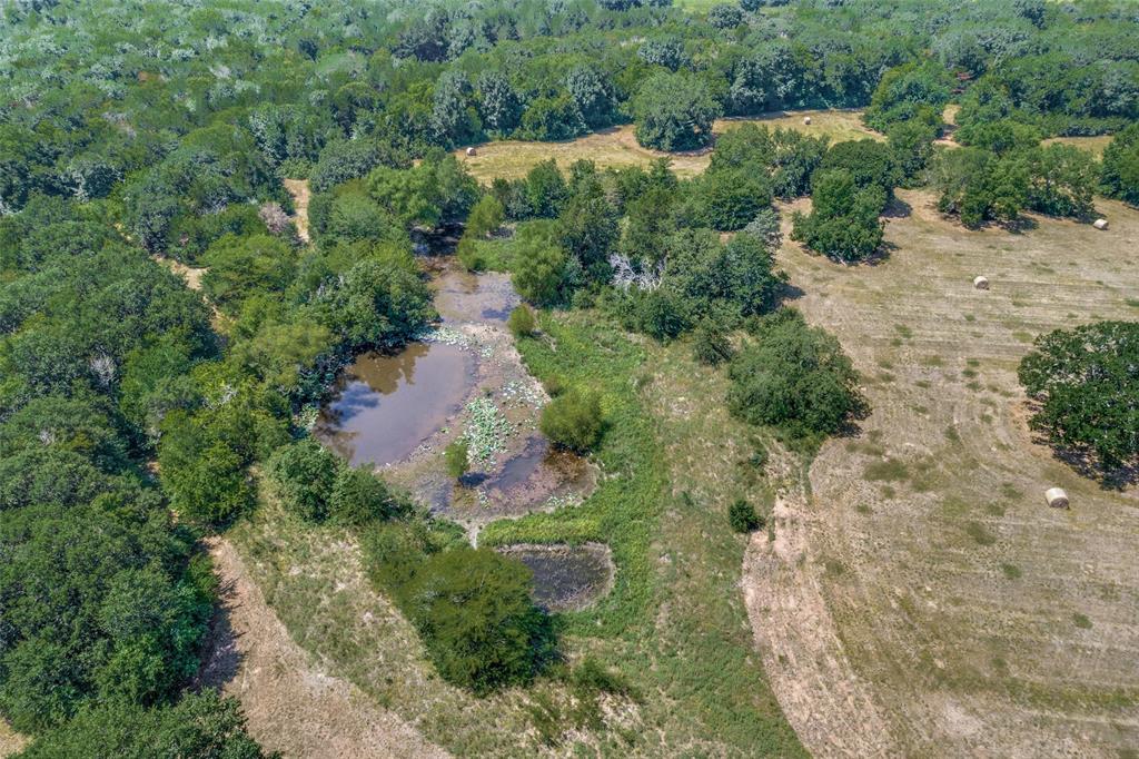 2102 County Road 2610 Bonham, TX 75418 - Photo 15 of 24 an aerial view of residential house with outdoor space