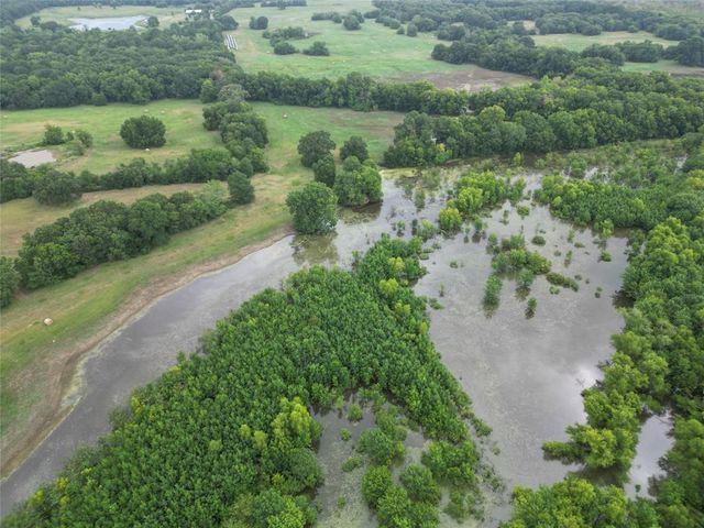 a view of a lake with a houses