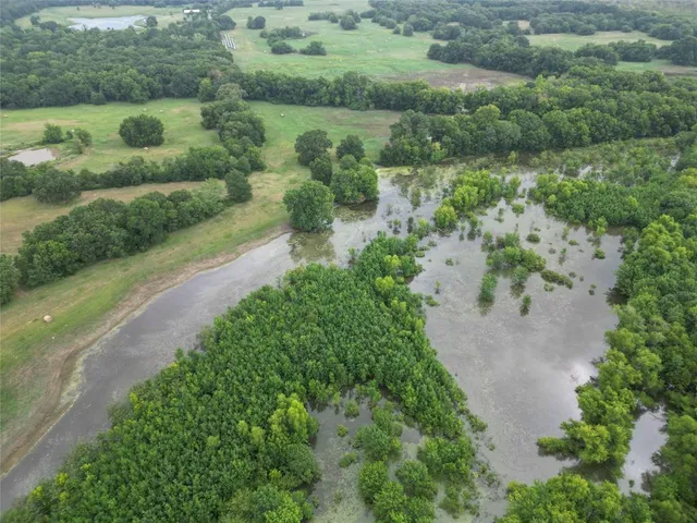a view of a lake with a houses