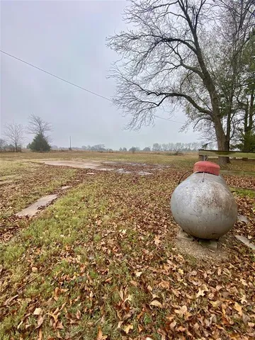 a view of an ocean with mountain