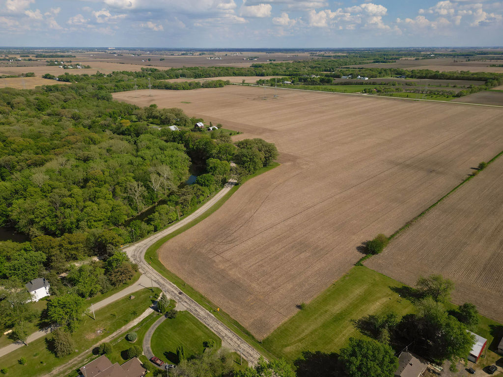 Lot 1 McArdle Road Mazon, IL 60444 - Photo 4 of 11 an aerial view of ocean with residential house and outdoor space