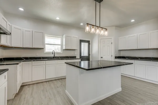 $399,999 | 104 Flor Del Sol Road, San Antonio, TX 78264