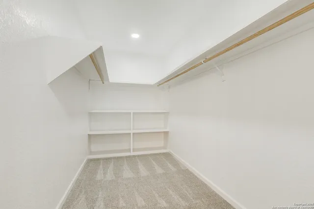 a view of a room with rack on the wall