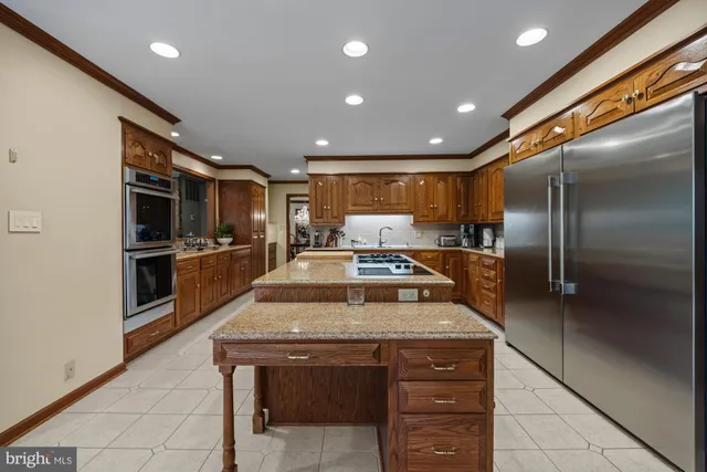 a bedroom with furniture and a fireplace