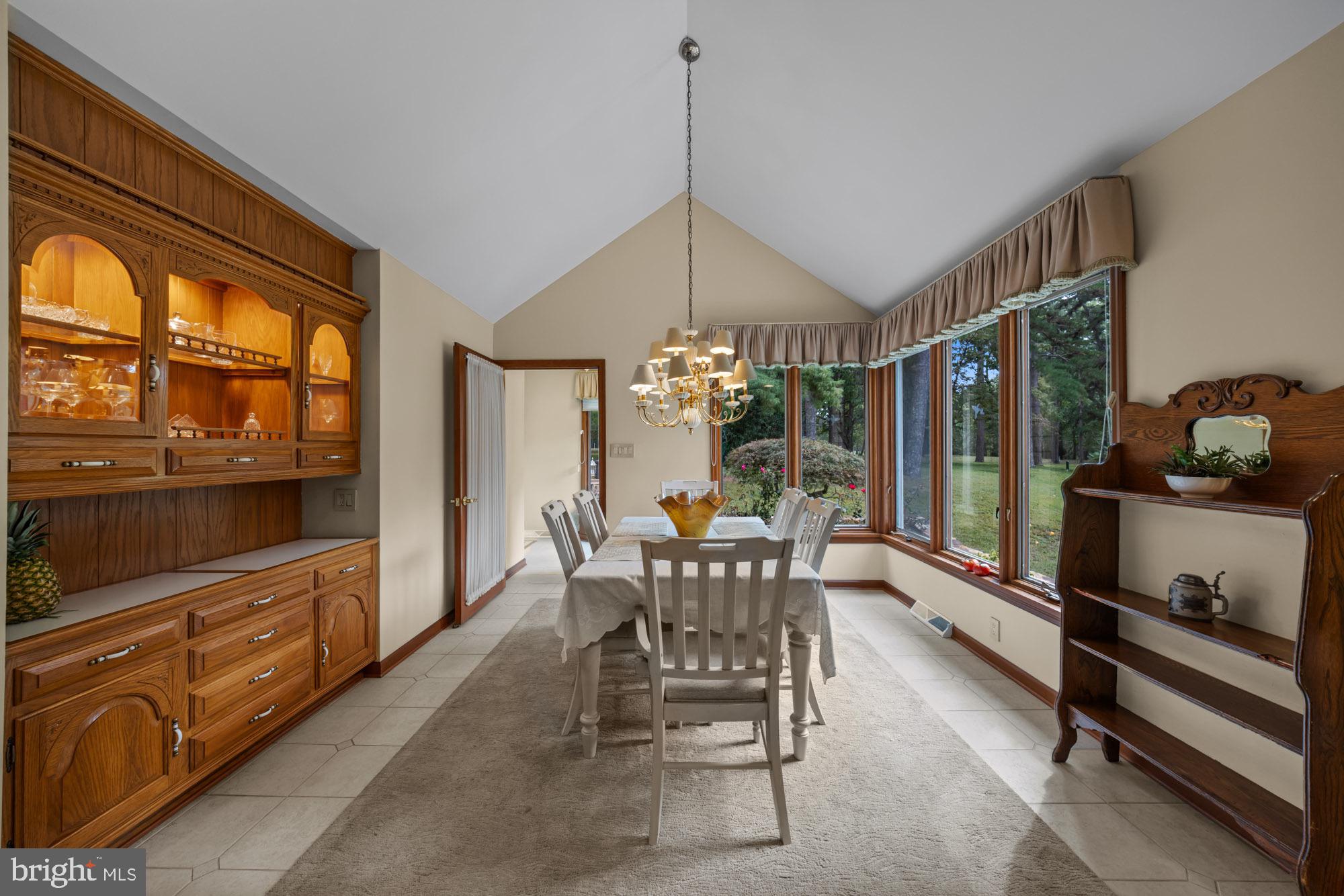 1528 Mays Landing Road Hammonton, NJ 08037 - Photo 17 of 94 a dining room with furniture a chandelier and fireplace