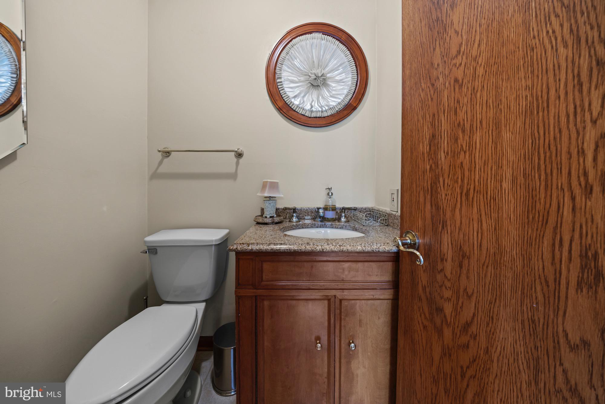 1528 Mays Landing Road Hammonton, NJ 08037 - Photo 20 of 94 a bathroom with a toilet and a sink