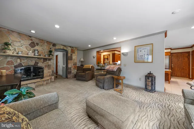 a bedroom with a bed and flat screen tv