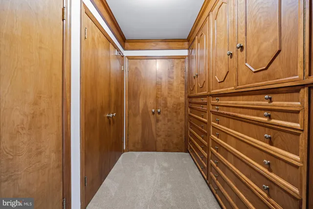 a living room with furniture and windows