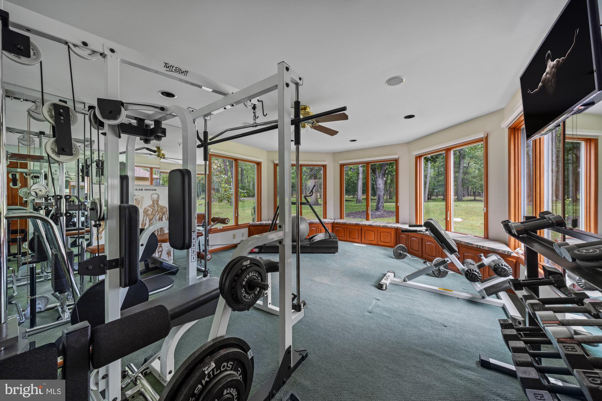 1528 Mays Landing Road Hammonton, NJ 08037 - Photo 34 of 94 a view of a room with gym equipment