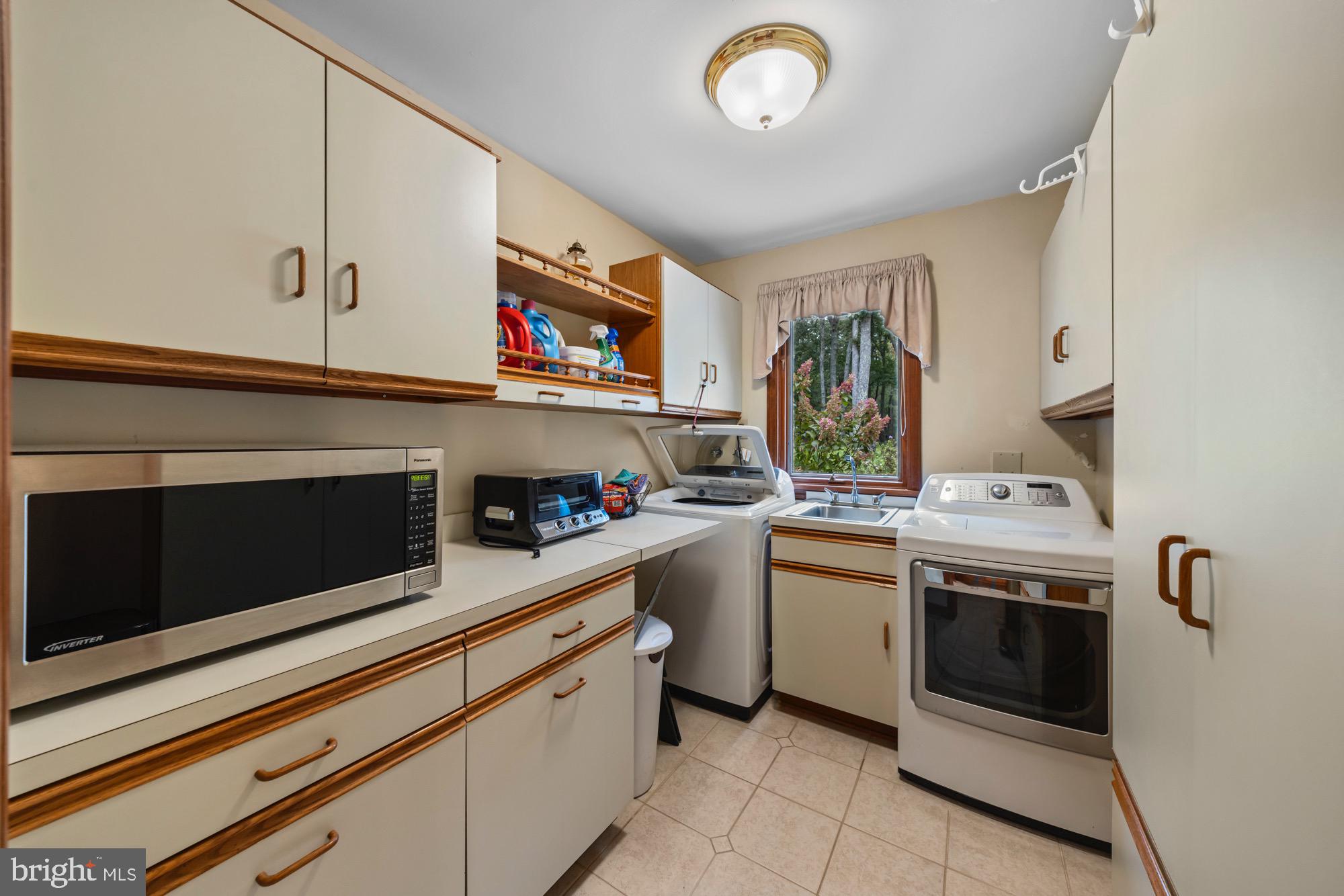 1528 Mays Landing Road Hammonton, NJ 08037 - Photo 36 of 94 a kitchen with a stove and a sink