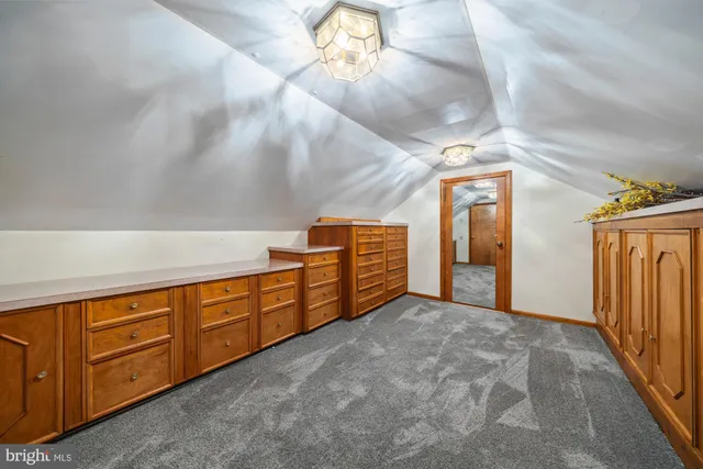 a bed room with a bed and wooden floor