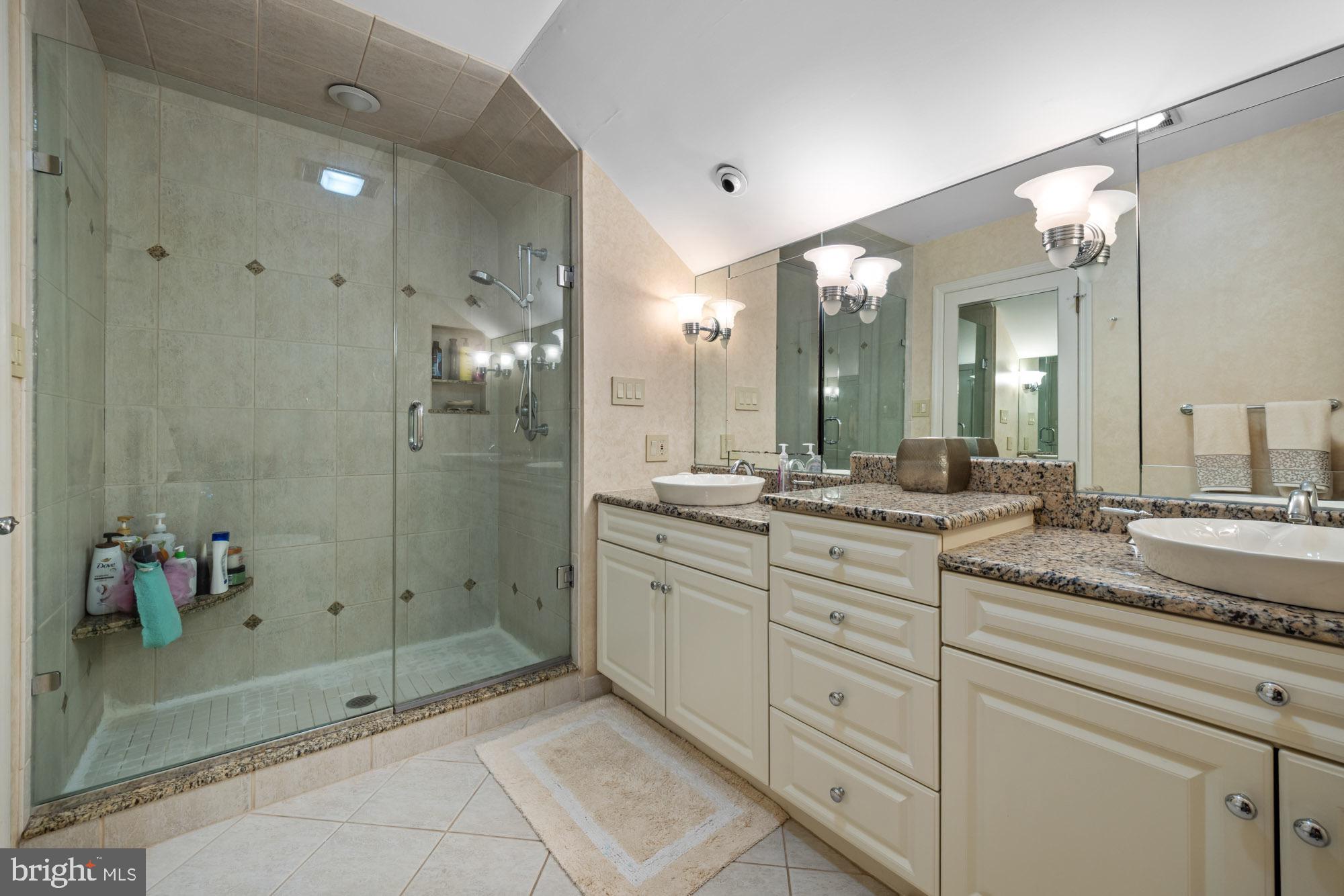 1528 Mays Landing Road Hammonton, NJ 08037 - Photo 44 of 94 a spacious bathroom with a granite countertop sink mirror and shower