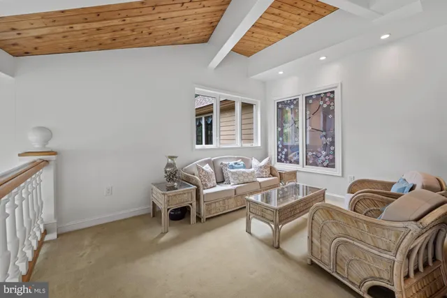 a front view of house with yard and swimming pool