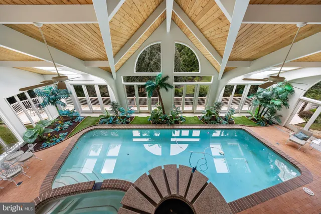 a view of a livingroom with furniture window and outdoor view
