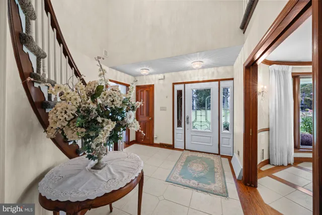 a kitchen with stainless steel appliances granite countertop a stove a sink dishwasher and a refrigerator