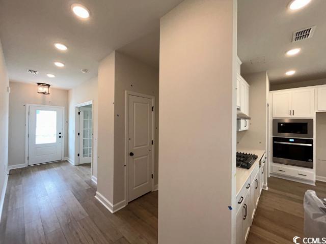249 Valerio Street Myrtle Beach, SC 29579 - Photo 19 of 39 Kitchen with dark wood-type flooring, appliances w