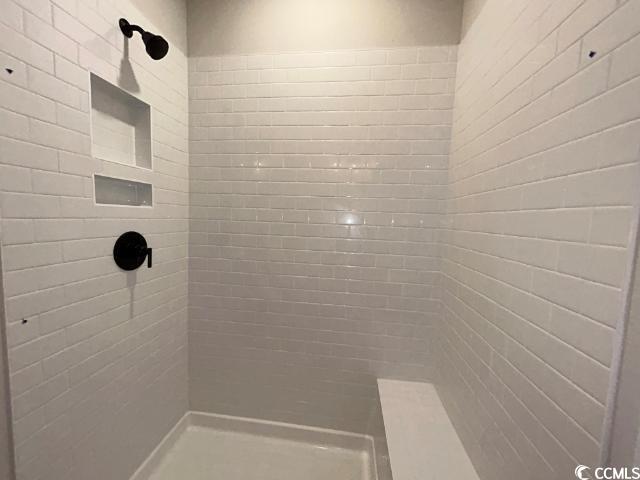 249 Valerio Street Myrtle Beach, SC 29579 - Photo 30 of 39 Bathroom with a tile shower