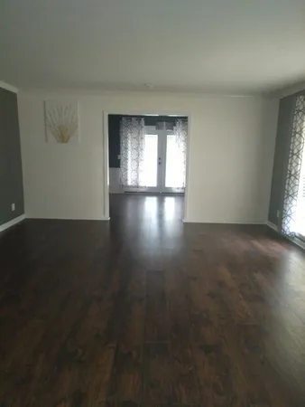 a view of a livingroom with furniture