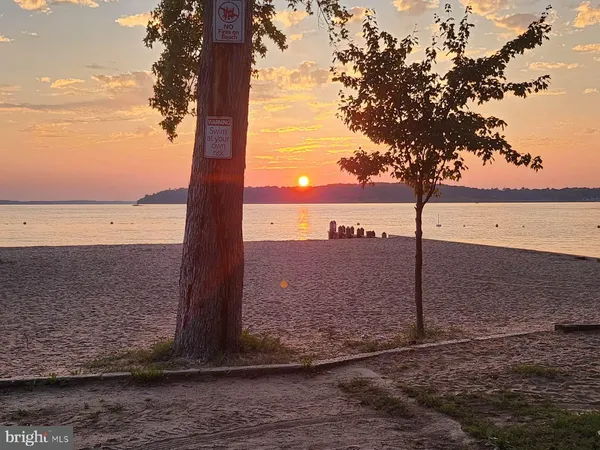a view of a road with an ocean view