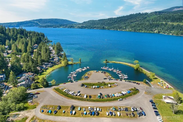 a view of a table and chairs in the lake