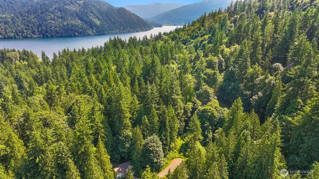 a view of a lake with a yard