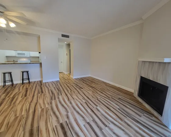 a bed room with a bed and a television