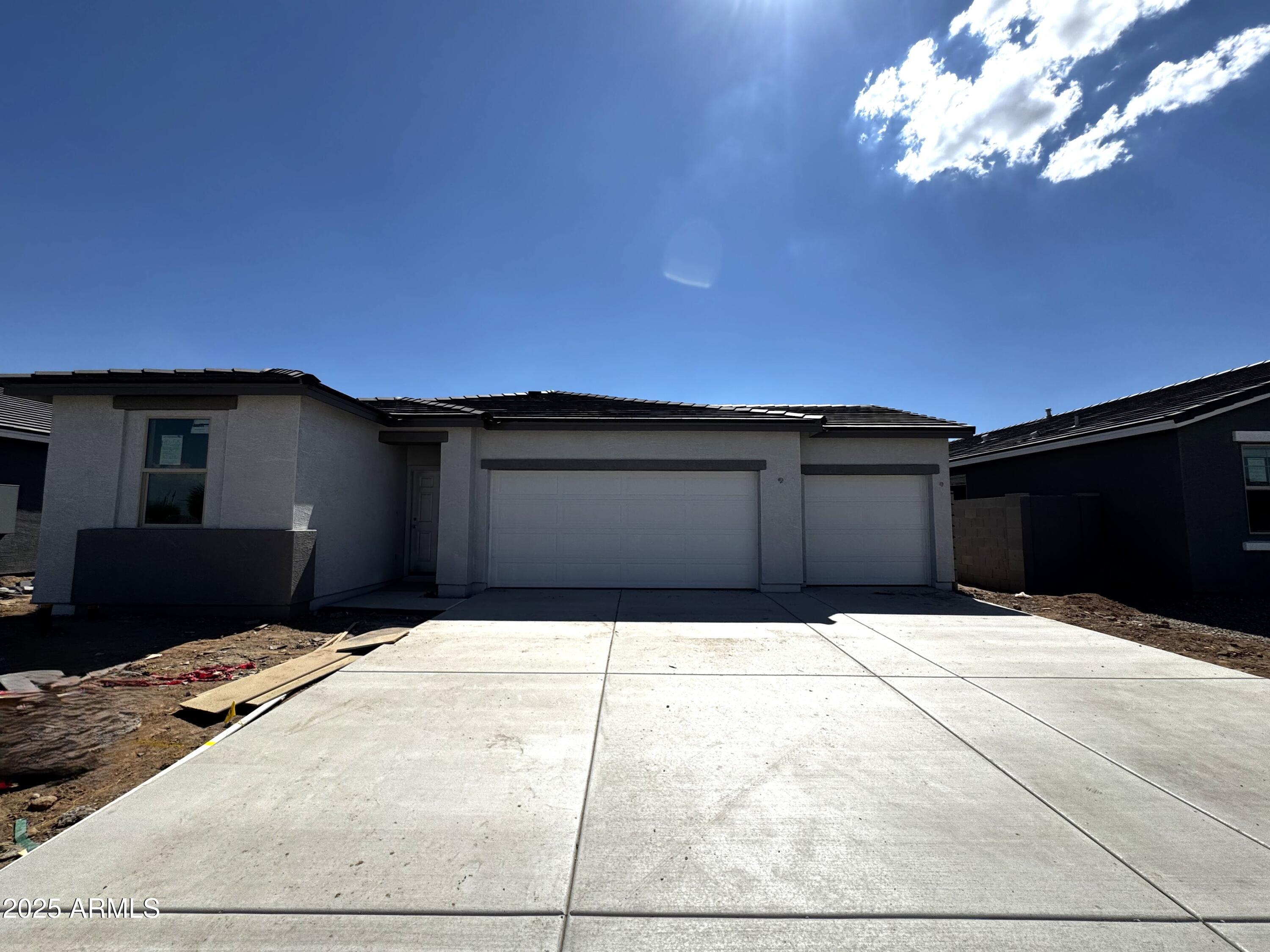 46835 West Old Timer Road Maricopa, AZ 85139 - Photo 2 of 25 a backyard of a house