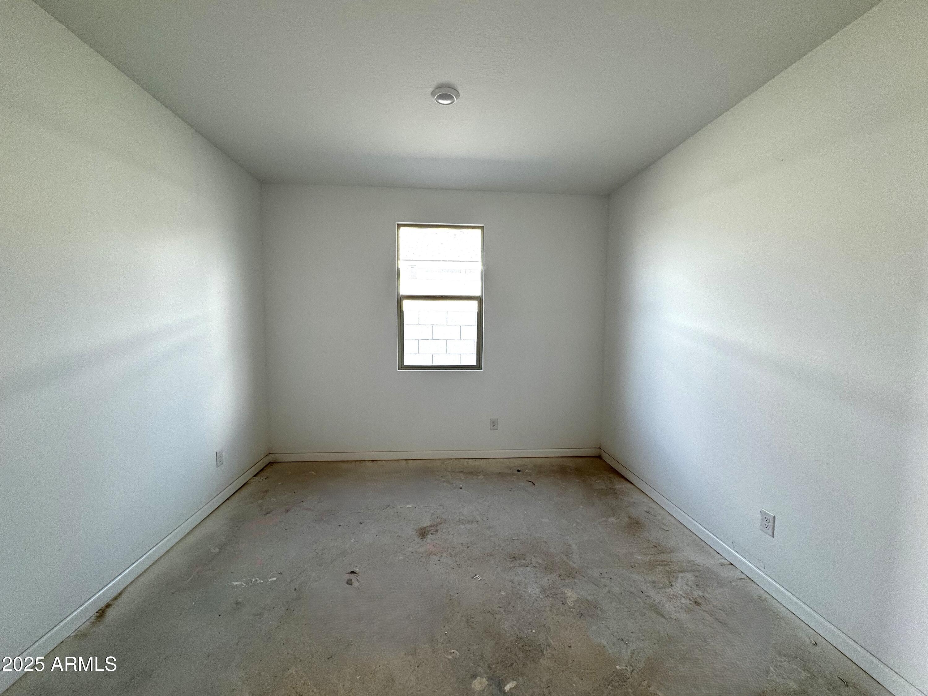 46835 West Old Timer Road Maricopa, AZ 85139 - Photo 6 of 25 an empty room with a window