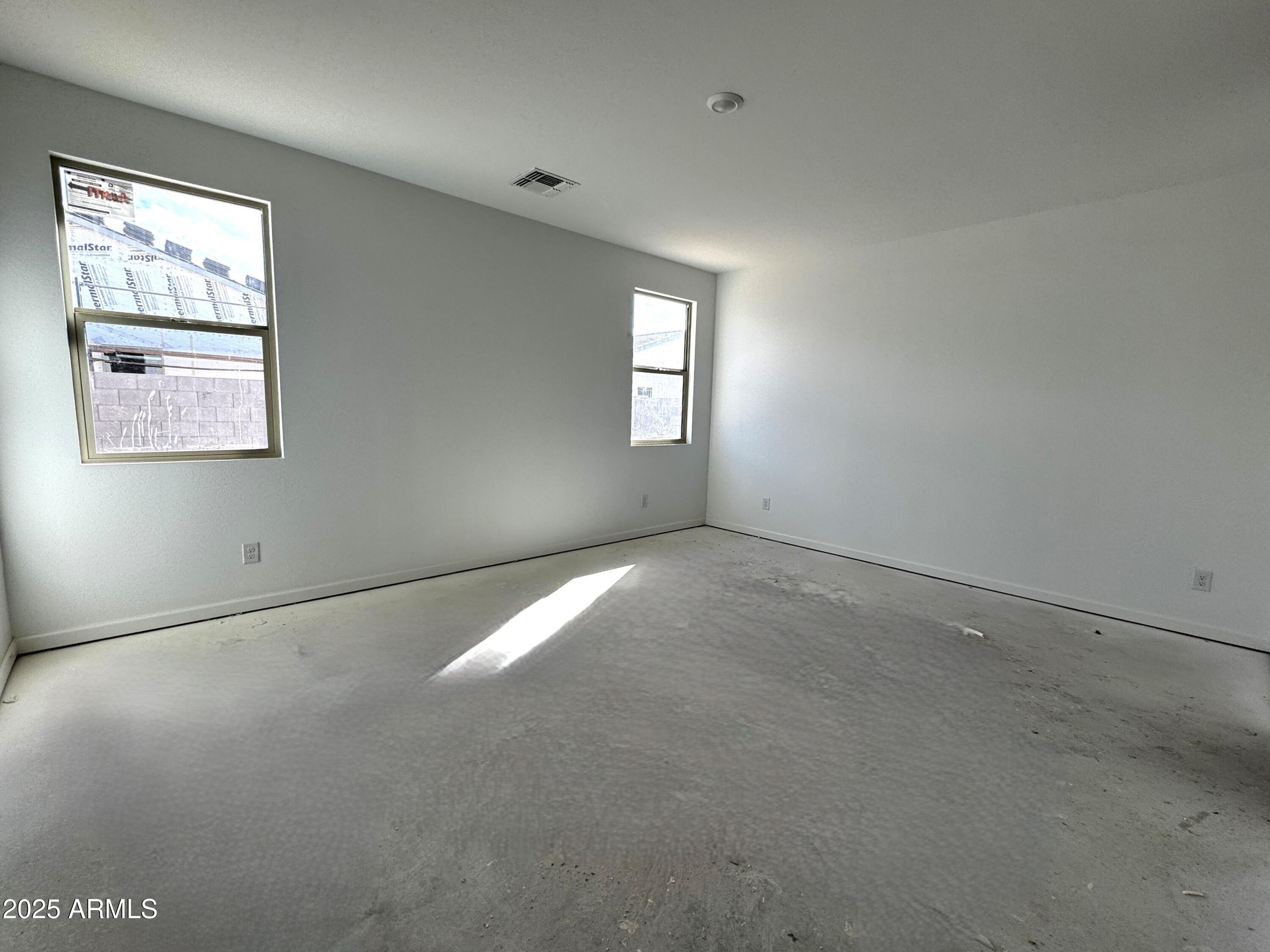 46835 West Old Timer Road Maricopa, AZ 85139 - Photo 9 of 25 an empty room with a window