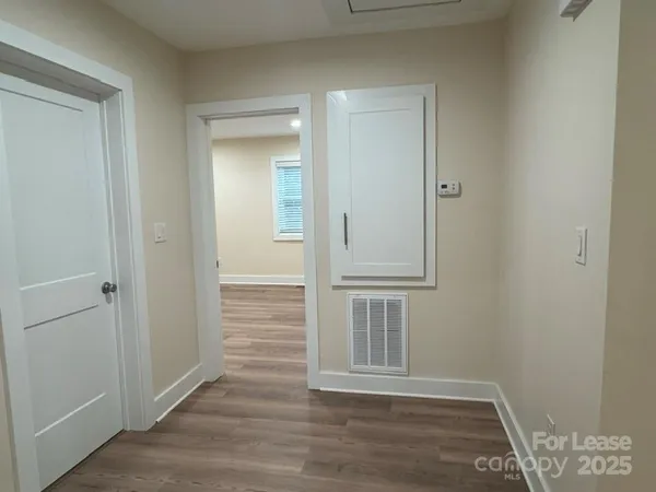 wooden floor and closet in a room