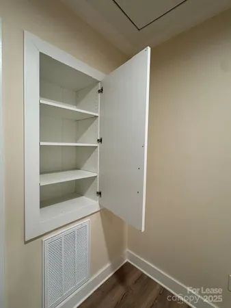 a view of an empty walk in closet