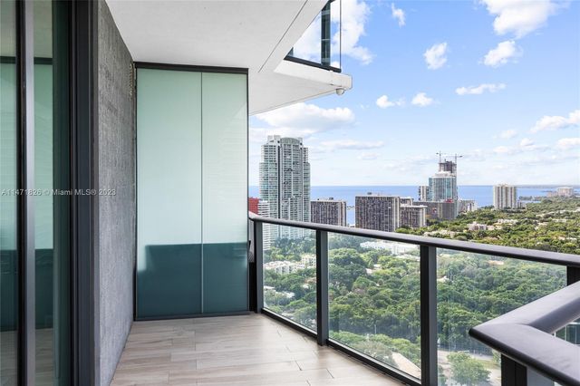 a view of a balcony with city view