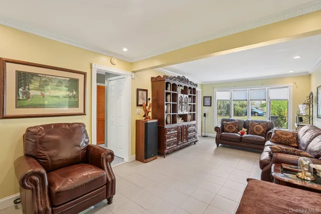 a living room with furniture and a couch