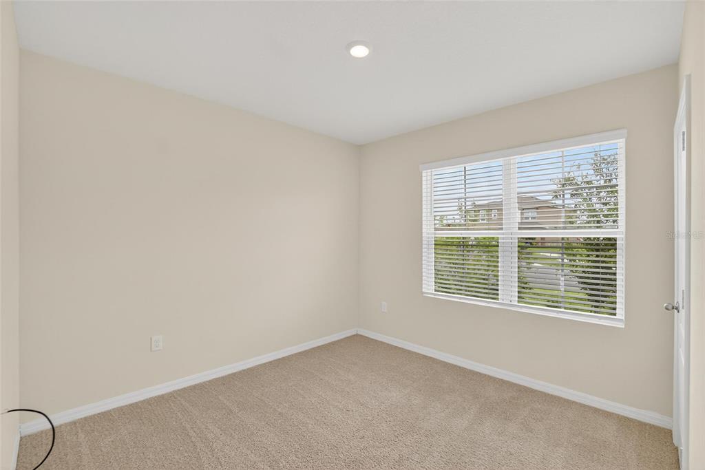 820 Sun Burst Road Winter Haven, FL 33880 - Photo 16 of 29 a view of an empty room with a window