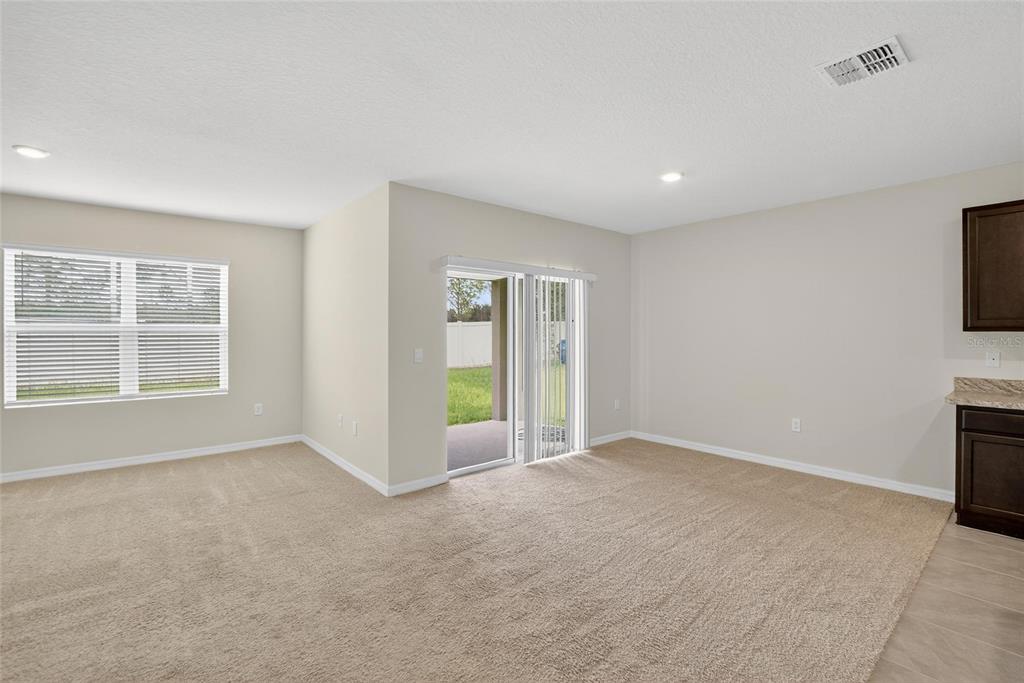 820 Sun Burst Road Winter Haven, FL 33880 - Photo 23 of 29 a view of an empty room with a window