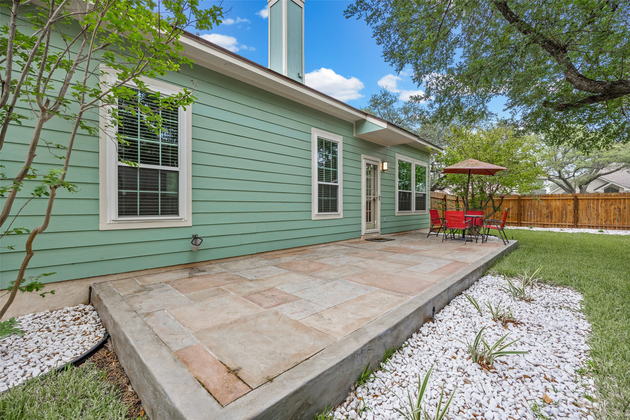 8610 Axis Drive Austin, TX 78749 - Photo 25 of 29 a house with garden in front of it