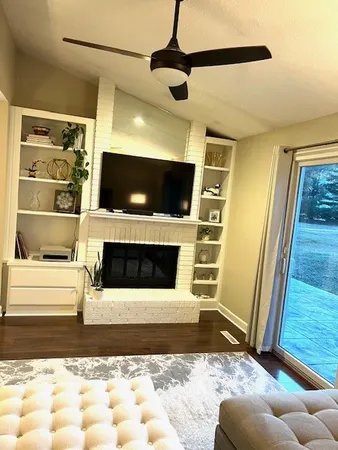 a spacious bedroom with a bed and a couch