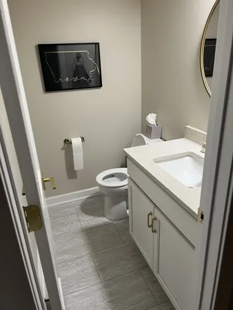 a kitchen with stainless steel appliances a refrigerator and a stove top oven