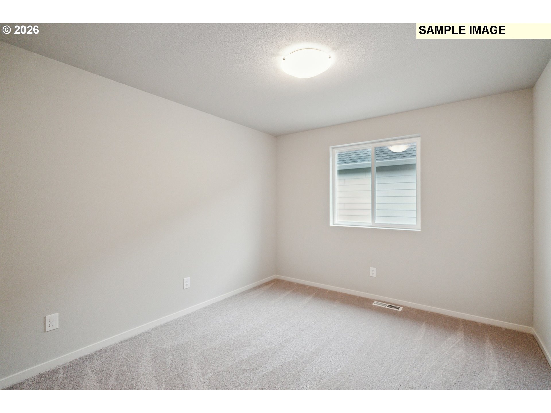 740 Merriott Lane Woodburn, OR 97071 - Photo 14 of 17 a view of an empty room with a window