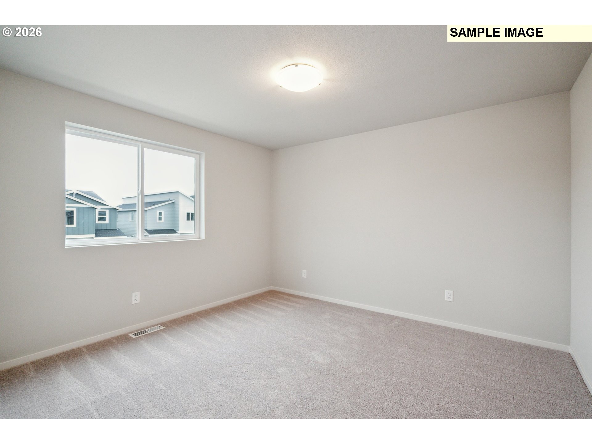 740 Merriott Lane Woodburn, OR 97071 - Photo 15 of 17 an empty room with windows
