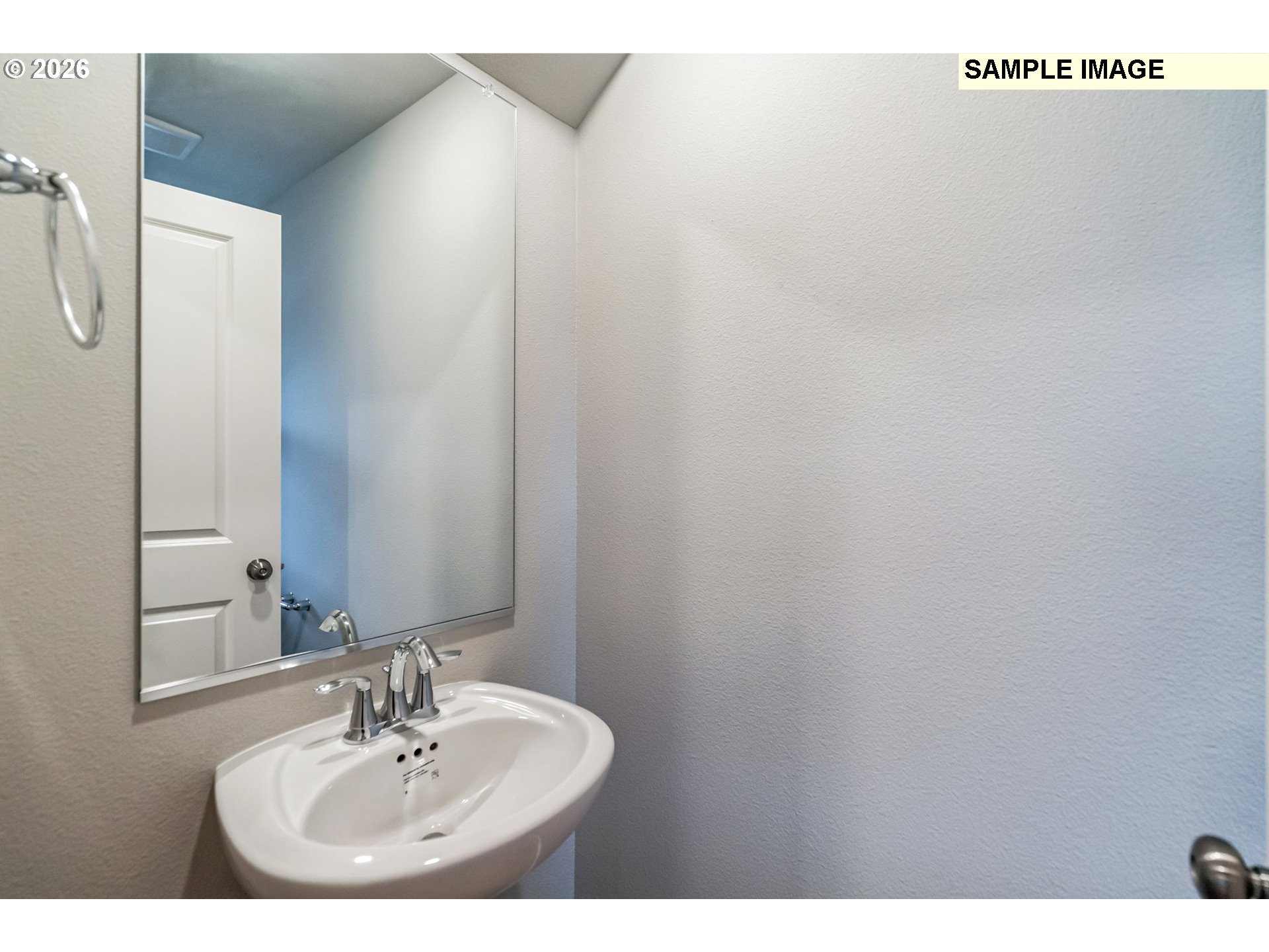 740 Merriott Lane Woodburn, OR 97071 - Photo 10 of 17 a bathroom with a sink and a mirror
