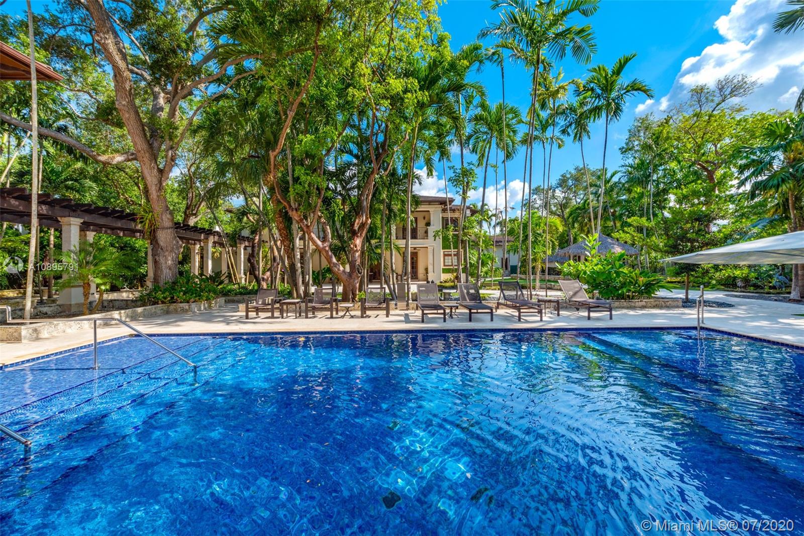 4800 Pine Drive Miami, FL 33143 - Photo 14 of 58 a view of pool with outdoor seating and yard