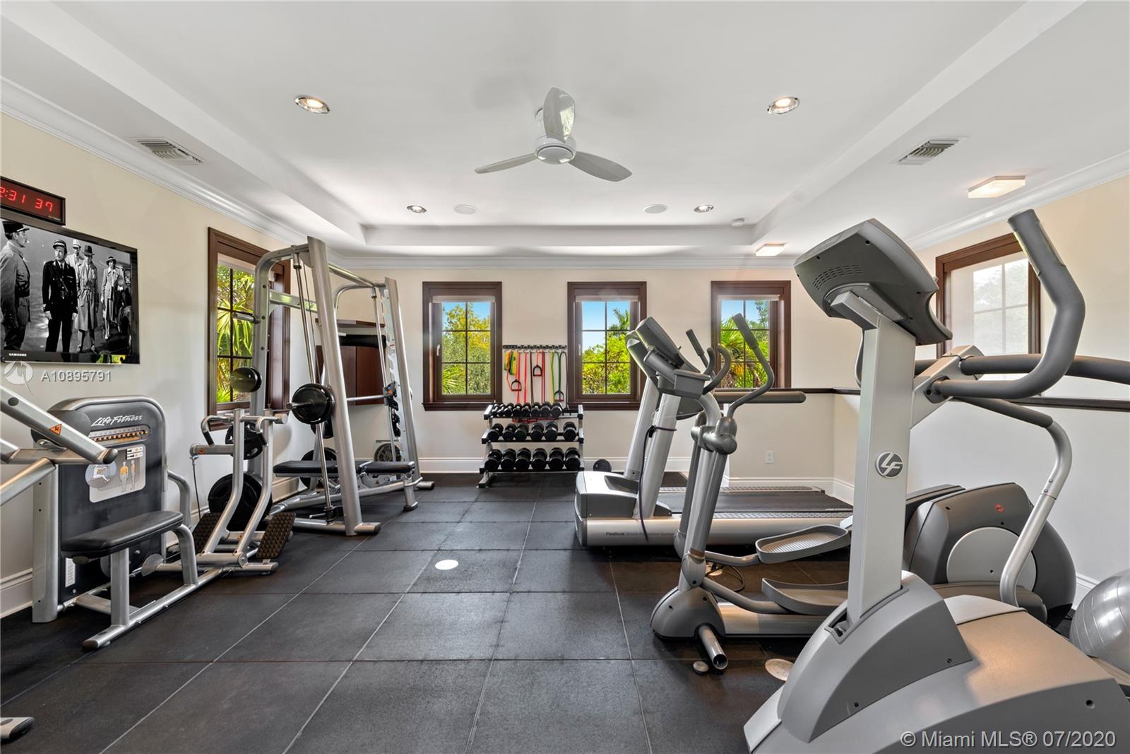 4800 Pine Drive Miami, FL 33143 - Photo 39 of 58 a view of a room with gym equipment