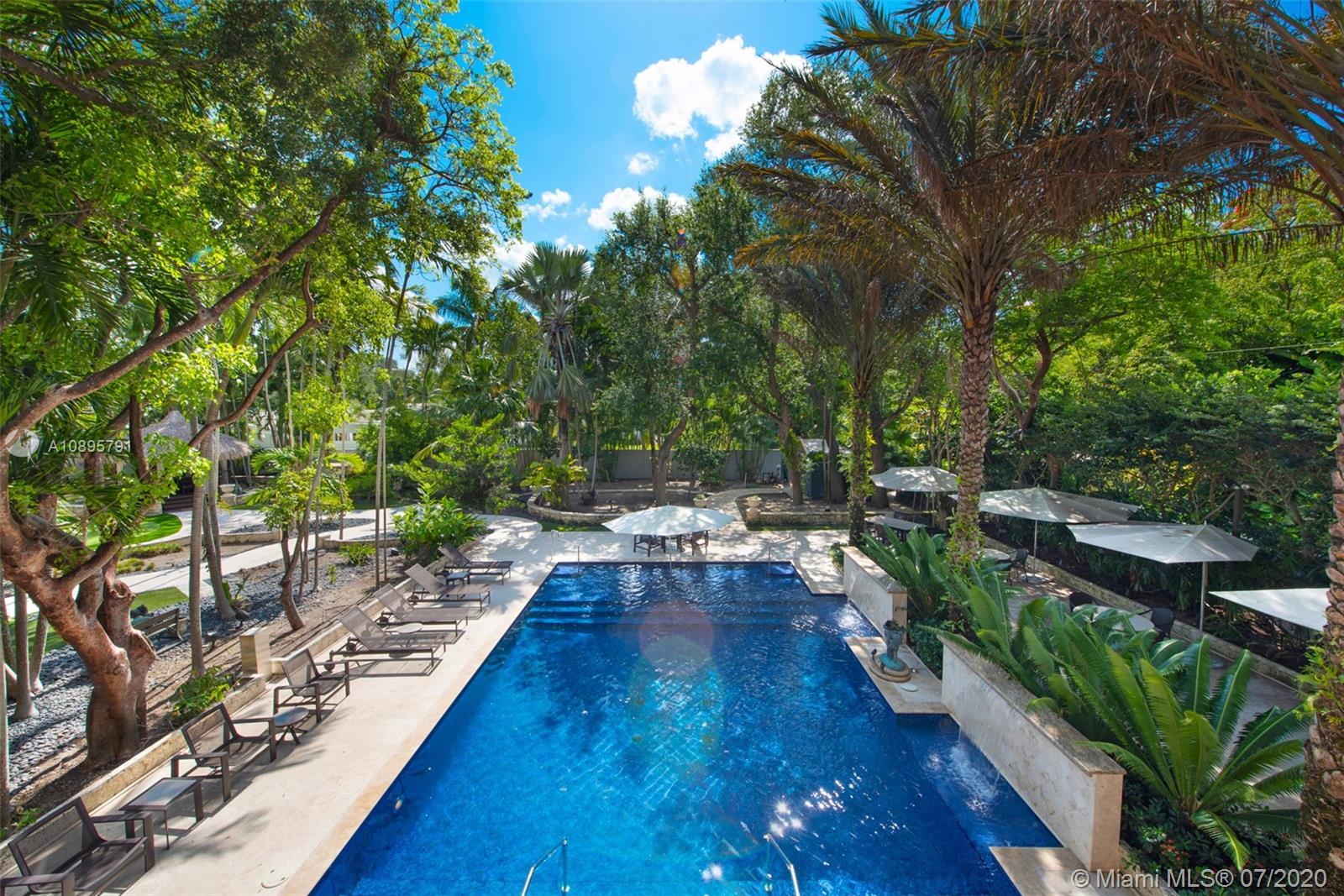 4800 Pine Drive Miami, FL 33143 - Photo 45 of 58 a view of backyard with sitting area