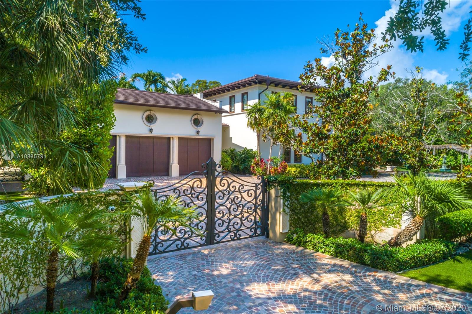 4800 Pine Drive Miami, FL 33143 - Photo 50 of 58 a view of a house with a yard