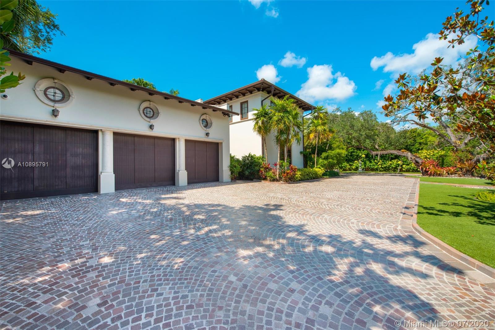 4800 Pine Drive Miami, FL 33143 - Photo 55 of 58 a view of a house with a yard