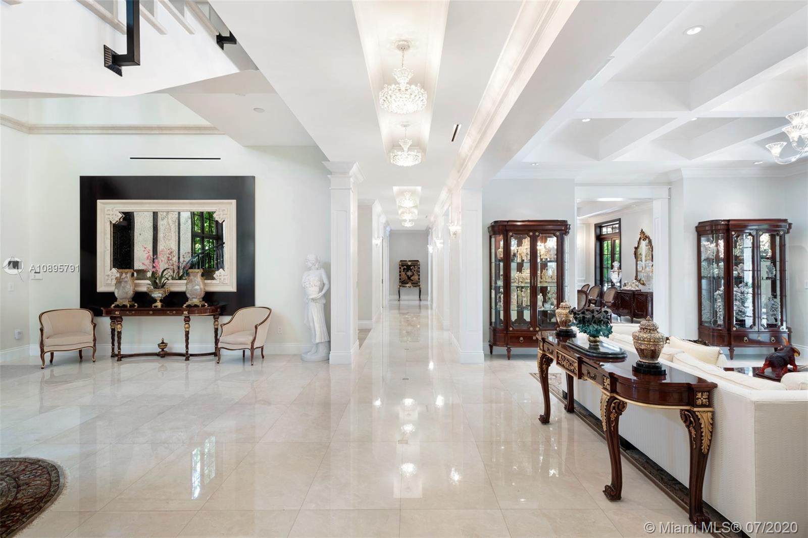 4800 Pine Drive Miami, FL 33143 - Photo 7 of 58 a living room with furniture and a large mirror