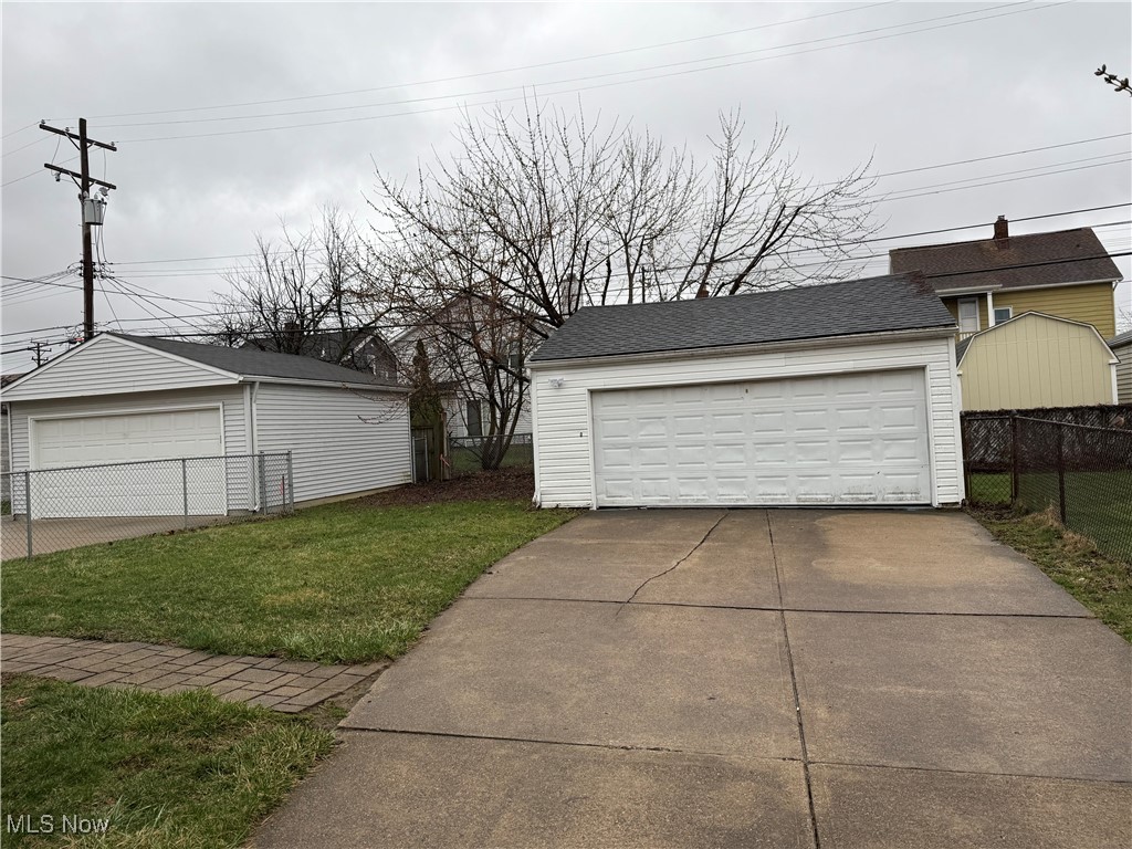 6807 Gerald Avenue Parma, OH 44129 - Photo 25 of 25 Detached garage with fence