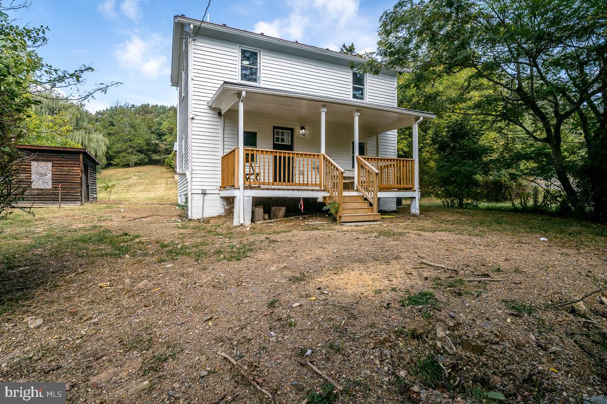 4771 Mill Creek Road Mount Jackson, VA 22842 - Photo 14 of 29 a view of a house with backyard